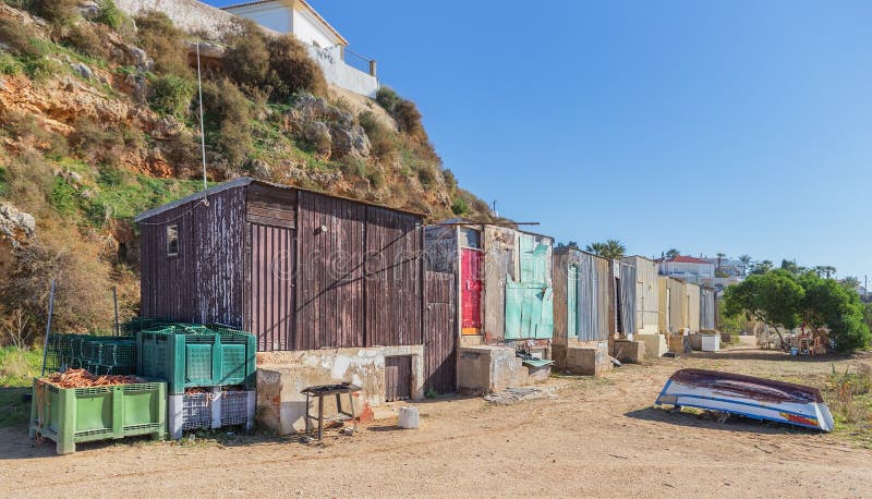 Fishing huts on the beach in the village of Ferragudo.