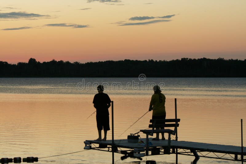 Fishing on the Lake at Sunset