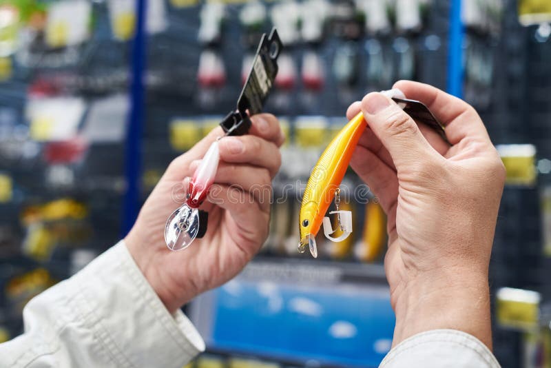 Fishing Lure Baits in Hands Man in Store Stock Image Image of store