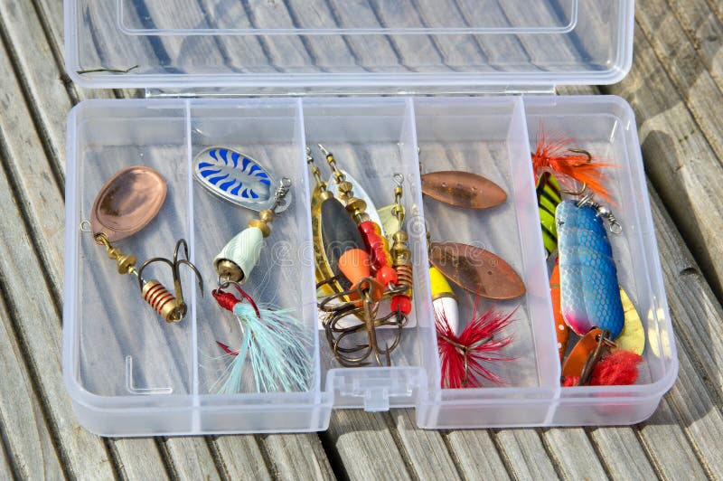 Fishing lures in box stock image. Image of fishing, plastic 59624999