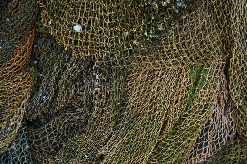 A Fishing Net is a Net Used for Fishing. Nets are Devices Made from Fibers  Woven in a Grid-like Structure Stock Photo - Image of wall, decor: 218166804