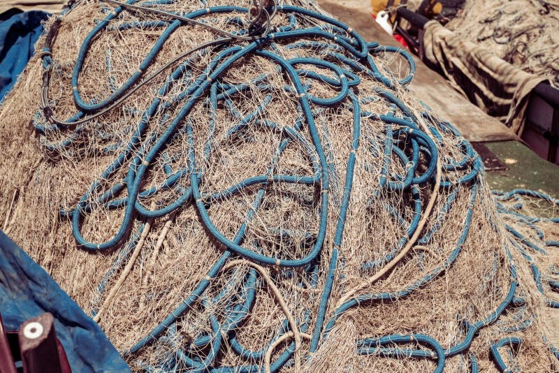 Fishing nets in the harbor stock image. Image of boat 122694515