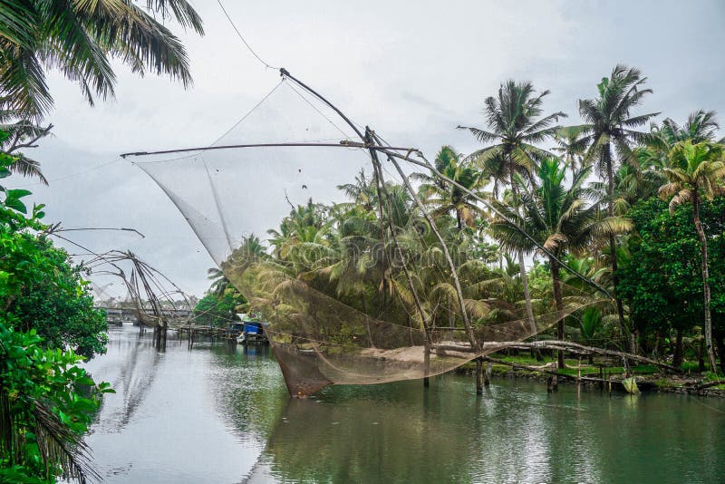 Traditional Fishing and Fishing Nets in Keralas Tropical River Stock