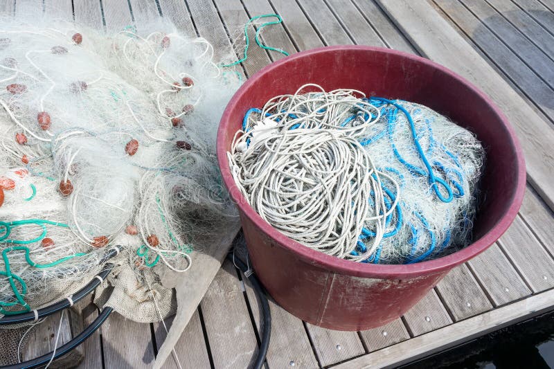 Fishing nets on pier stock photo. Image of bobber, tangle 69222028