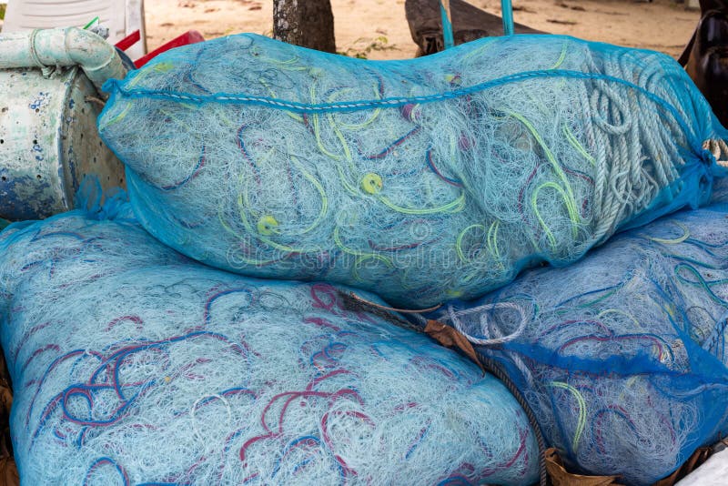 Fishing Nets Rolled Up and Packed in Transparent Bags. Fishing in Asian