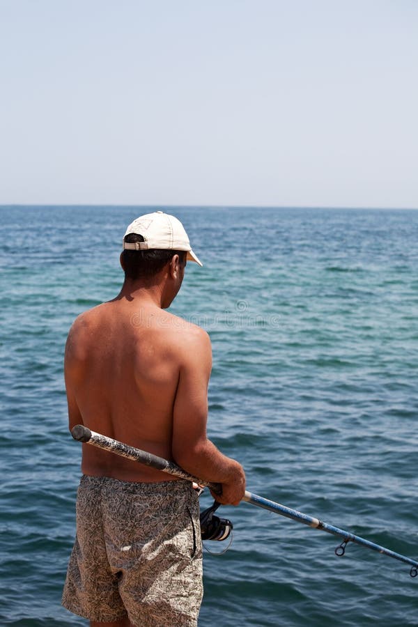 Fishing in the ocean royalty free stock image
