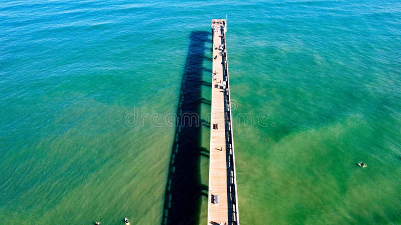 Fishing pier going into the Atlantic Ocean from the east coast of Florida located in St Augustine