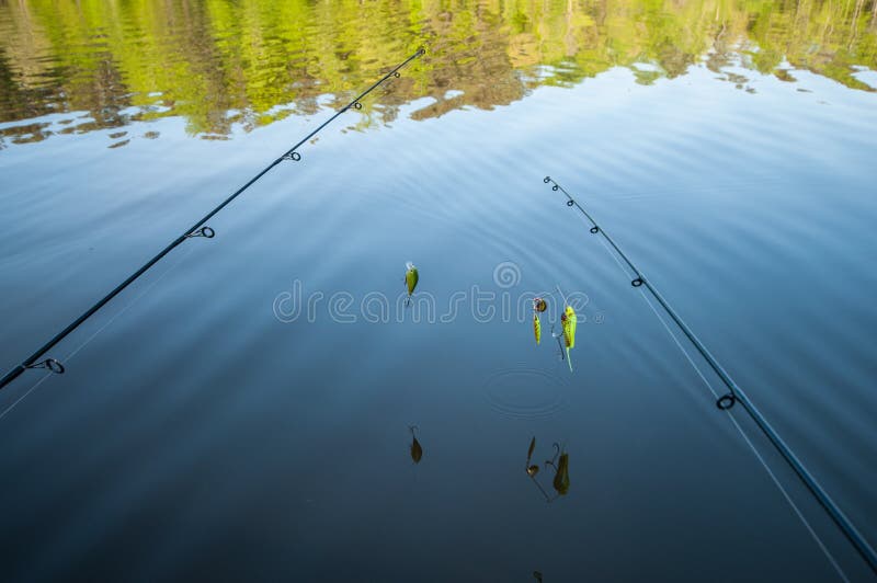 Fishing Poles Over Still Lake Stock Image Image of father, friendship
