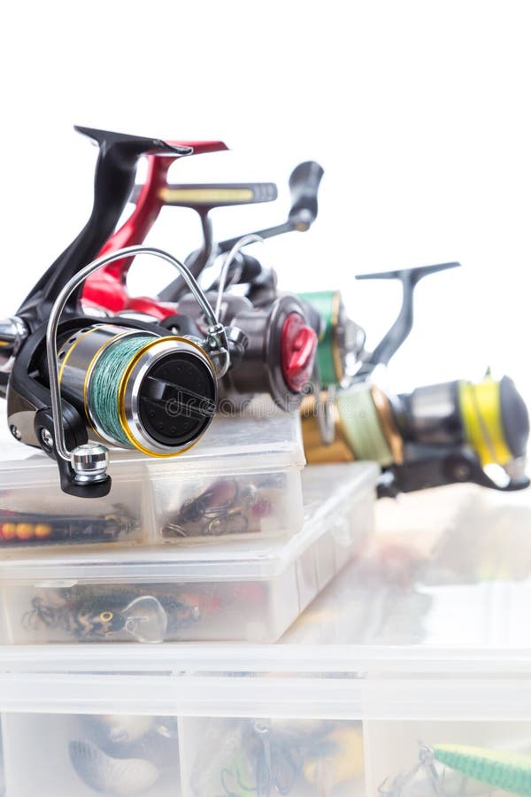 Fishing Reels on Storage Boxes with Baits Stock Photo Image of