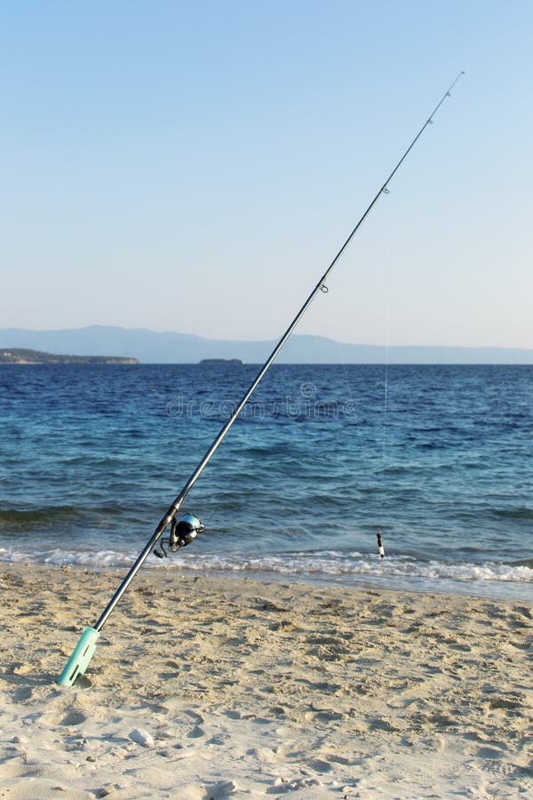 Fishing Rod on Beach Shore at Sunset Stock Image Image of lifestyles