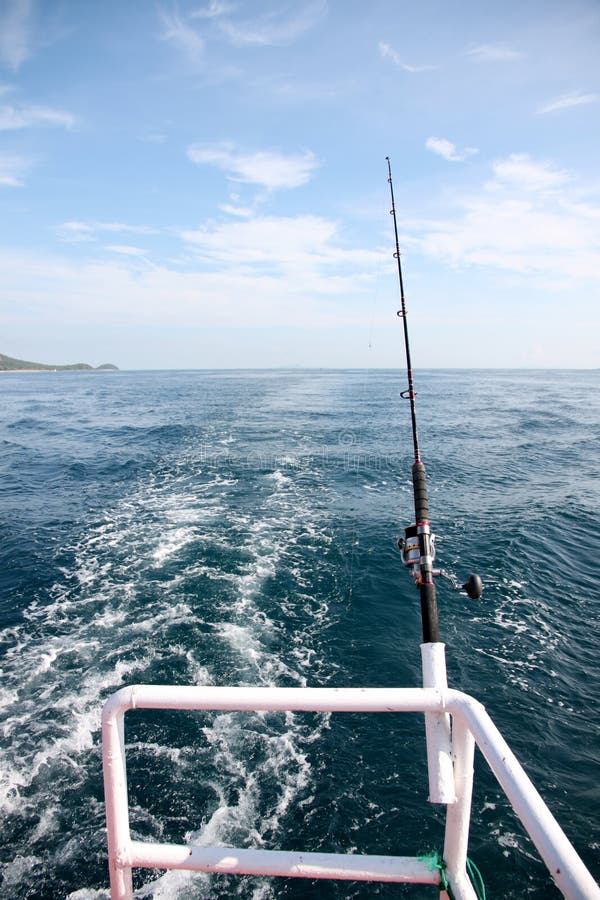 Fishing rod on a boat. stock photo. Image of weather 44375214