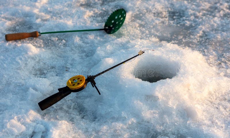 Fishing rod on ice in winter. Ice fishing stock images