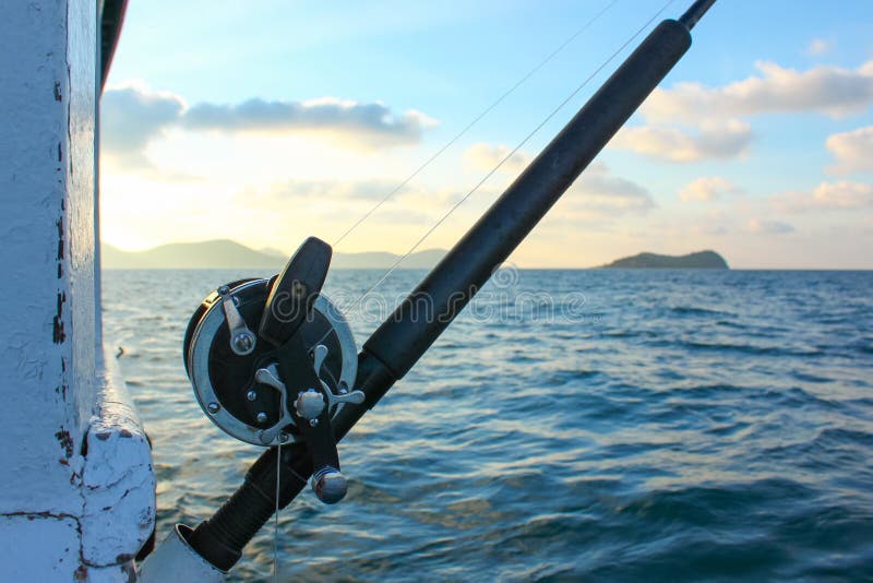 Fishing rod are prepared offshore fishing on the boat in ocean.