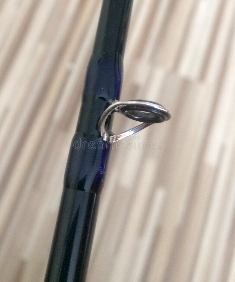 FIshing Rod Ring Details with Green Camouflage Line on Green Background