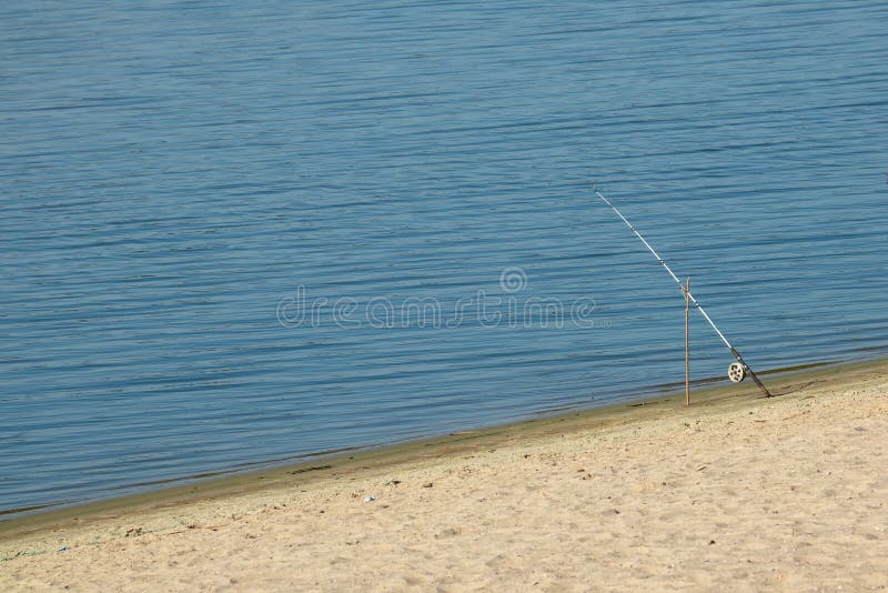 Fishing Rod on the Bank of the Wide. Dnieper River on an Autumn