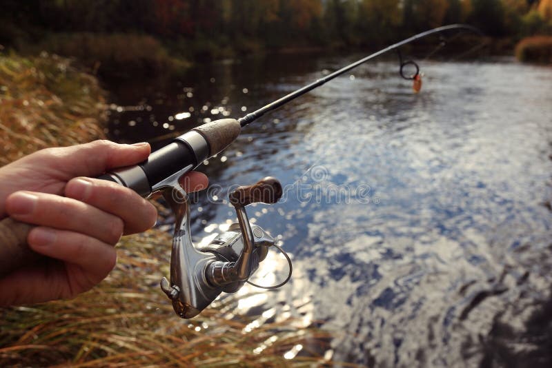 Fishing Spinning in His Hand Stock Image Image of male, grayling