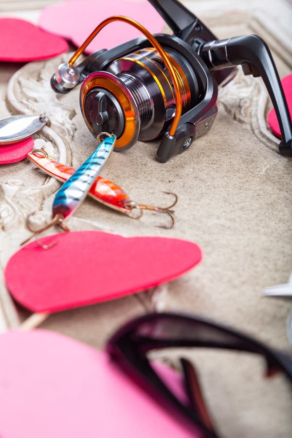 Fishing Tackles, Lines and Reel with Spring Decoroation Stock Photo