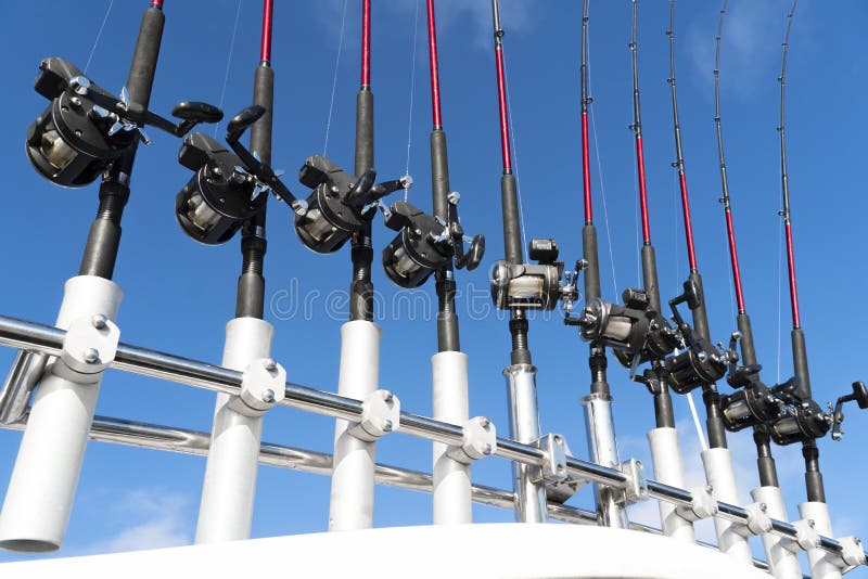 Fishing Trolling Boat Rods in Rod Holder. Big Game Fishing. Fishing Reels  and Rods Pattern on Boat Stock Image - Image of beautiful, sailing:  200994747