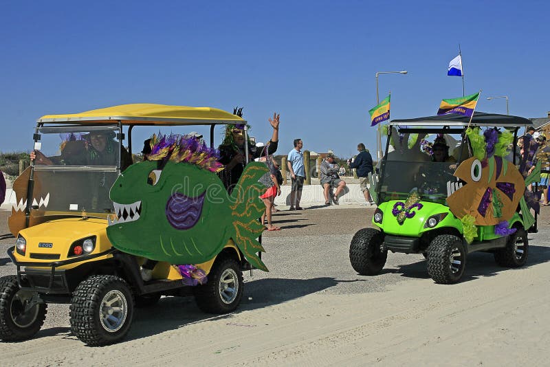 `Fishy` Golf Carts in the Barefoot Mardi Gras Parade. Two `fishy` golf carts participted in the Barefoot Mardi Gras Parade on February 25, 2017 held at Balli royalty free stock image `Fishy` Golf Carts in the Barefoot Mardi Gras Parade. Two `fishy` golf carts participted in the Barefoot Mardi Gras Parade on February 25, 2017 held at Balli royalty free stock image