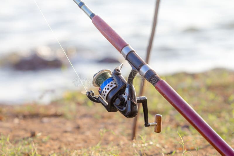 Close up of fishing pole with spinning. Close up of fishing pole with spinning