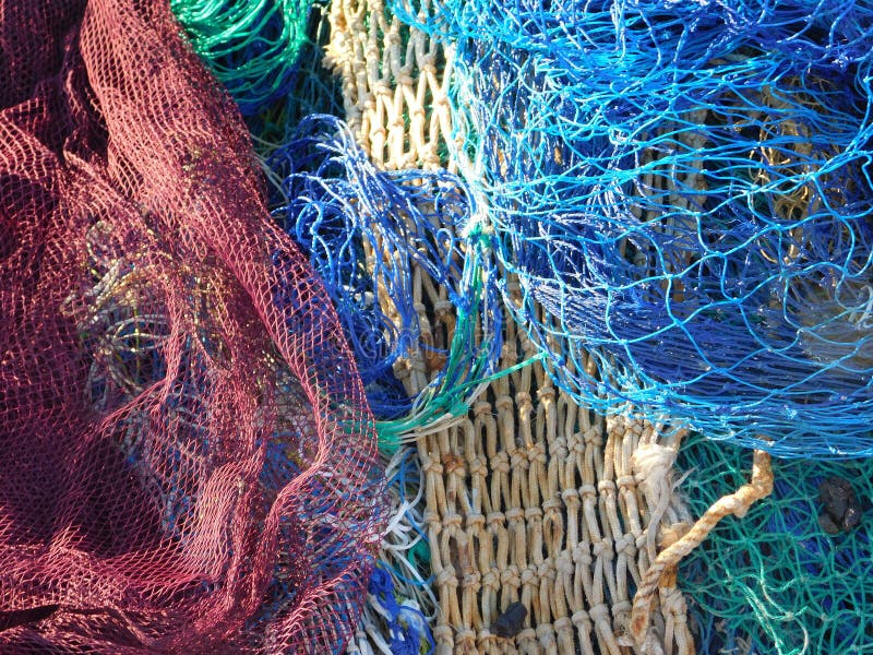 Fisknät på skeppsdockan royaltyfri foto Fisknät på skeppsdockan royaltyfri foto