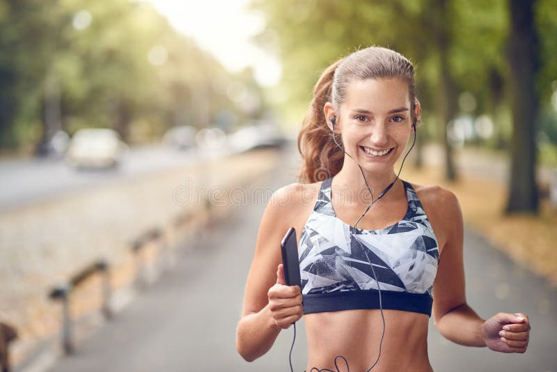 Fit Healthy Athletic Woman Jogging on a River Bank Stock Image - Image ...