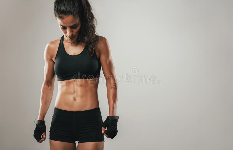 Free: Three multi ethnic women in sport bra posing in the gym 