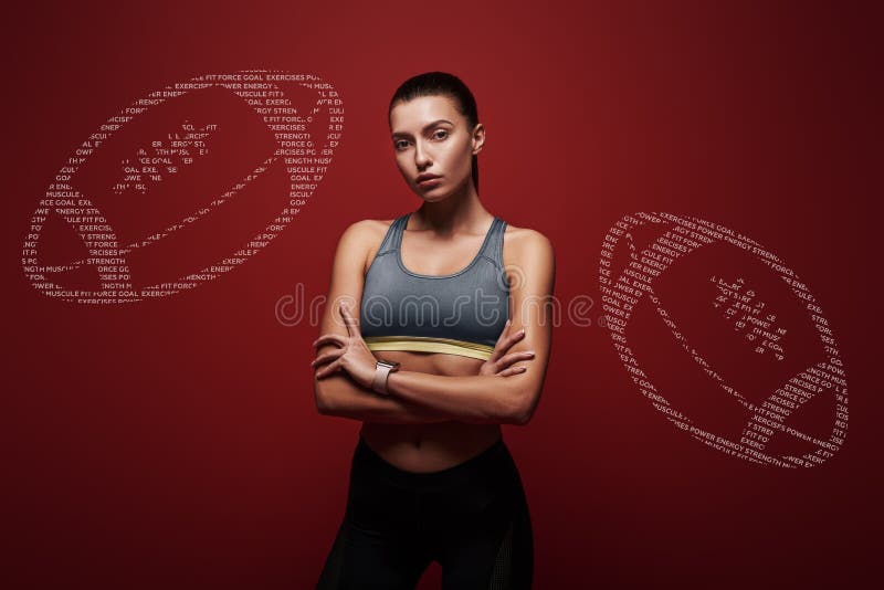 Fit looks good for every body. Young sportswoman standing with her arms crossed over red background. stock photos Fit looks good for every body. Young sportswoman standing with her arms crossed over red background. stock photos