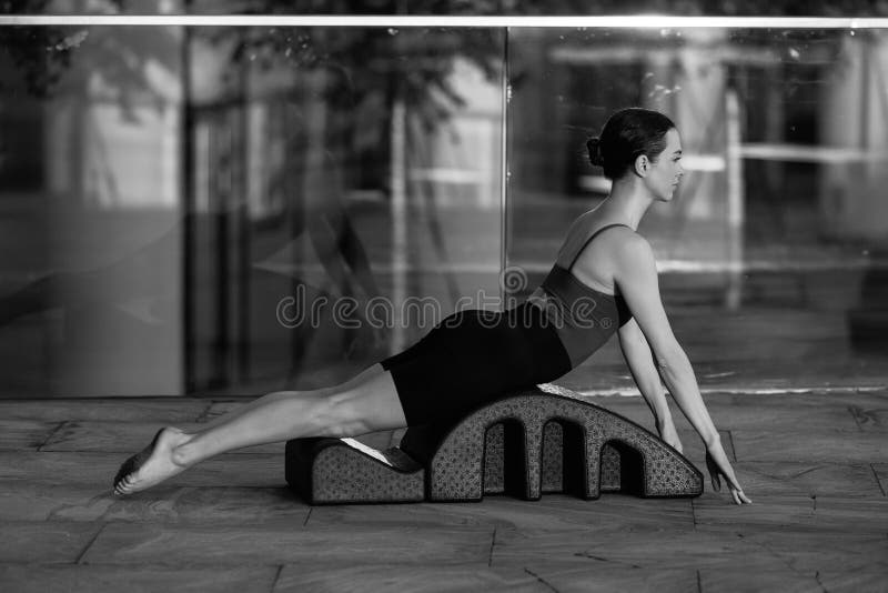 Balanced Body Pilates Arc. Three Asian Women Exercising on Pilates Arc.  Stock Image - Image of fitness, barrel: 300015321