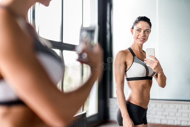 100+ Woman Gym Mirror Selfie Stock Photos, Pictures & Royalty-Free