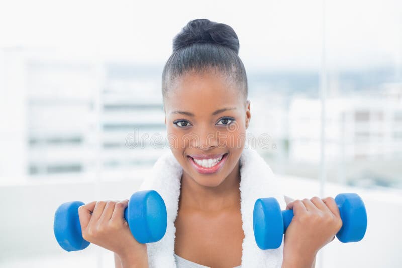 Fit Woman Towel Around Her Neck Working Out Dumbbell Stock Photos - Free &  Royalty-Free Stock Photos from Dreamstime