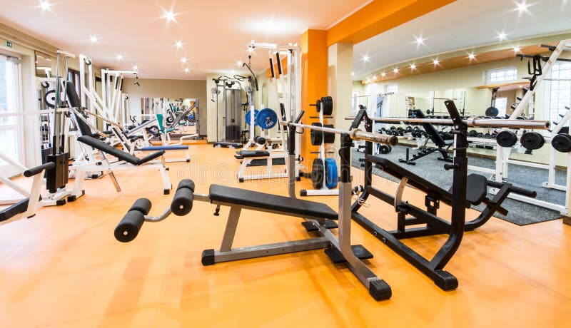 Interior view of a gym with equipment. Interior view of a gym with equipment.