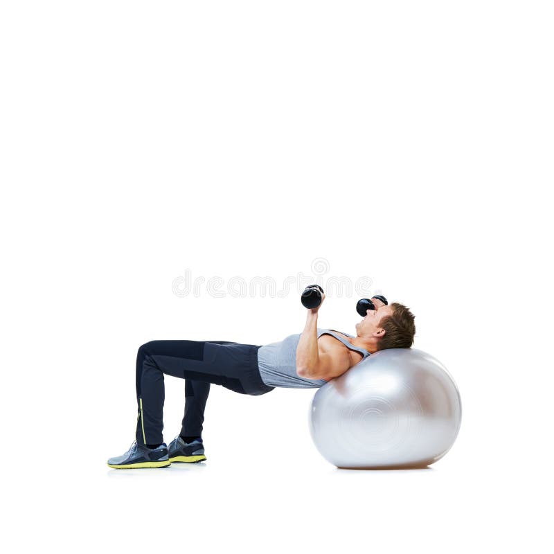 Fitness dumbbell eller man med träningskula i studio för att hitta kärnkraft eller balans på vit bakgrund. Arbeta royaltyfria bilder