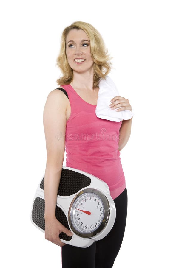 Fitness female holding a scale