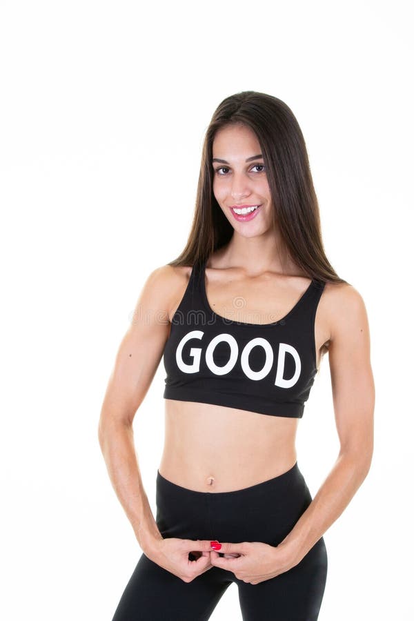 Fitness fit young woman posing with perfect body in white background. A fitness fit young woman posing with perfect body in white background royalty free stock photography Fitness fit young woman posing with perfect body in white background. A fitness fit young woman posing with perfect body in white background royalty free stock photography