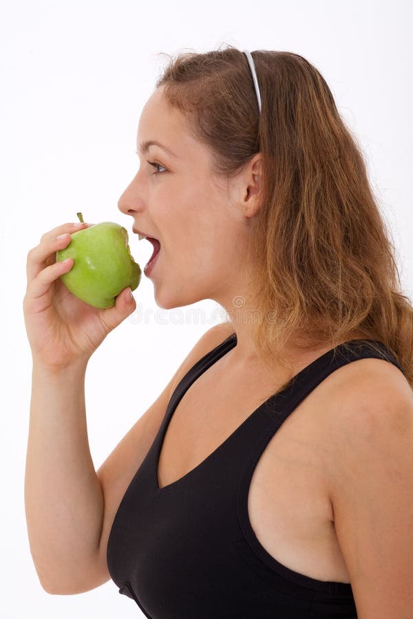 Fitness girl with apple