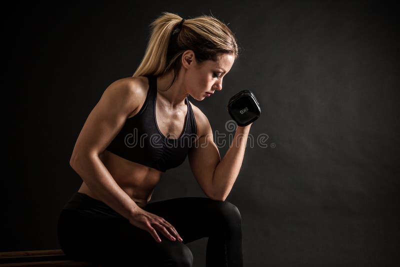 Beautiful Athletic African American Girl Demonstrating Biceps Free