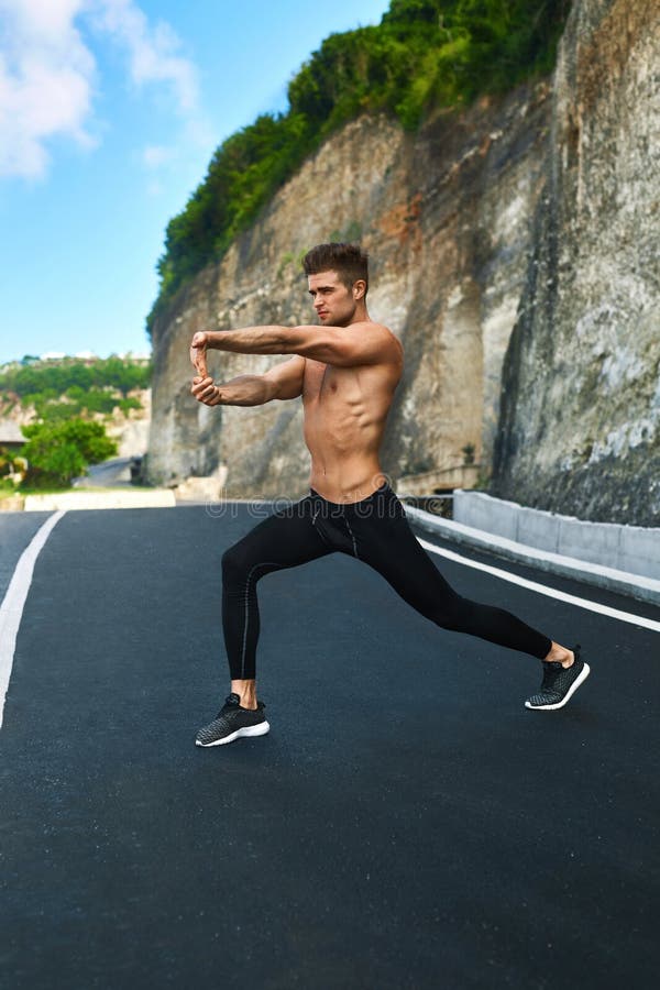 Fotografia do Stock: Fitness Exercise. Athletic Active Man With
