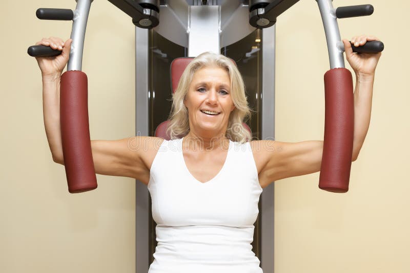 Fitness mature woman stock image. Image of middle, house 33188187