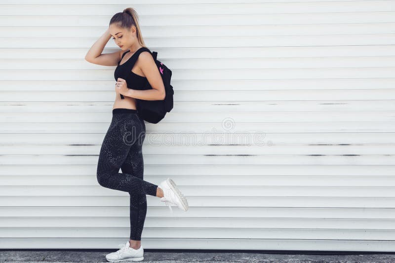 Fitness sporty girl wearing fashion clothes royalty free stock images Fitness sporty girl wearing fashion clothes royalty free stock images