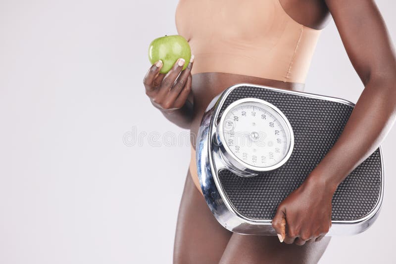 https://thumbs.dreamstime.com/b/fitness-wellness-black-woman-scale-apple-hand-isolated-white-background-studio-exercise-nutrition-slim-diet-260874973.jpg