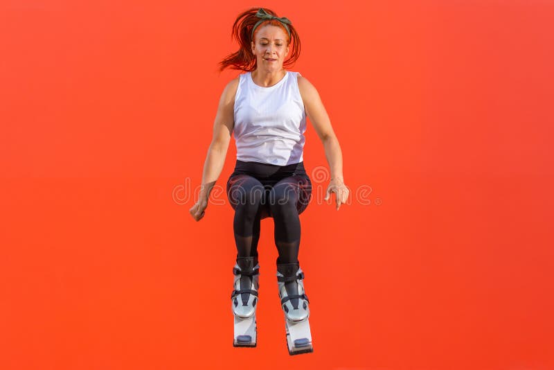 Woman Exercising and Jumping with Kangoo Jumps Shoes Stock Photo - Image of  energy, healthy: 71687136