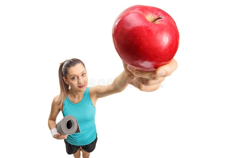 Fitness Woman with an Exercise Mat and an Apple Stock Image Image of