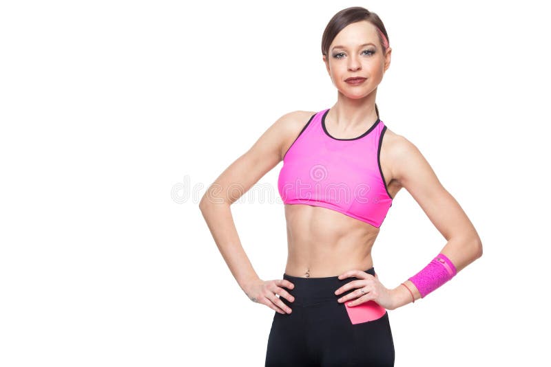 Fitness woman portrait isolated on white background. Smiling happy female fitness model looking at camera. Fresh stock photos