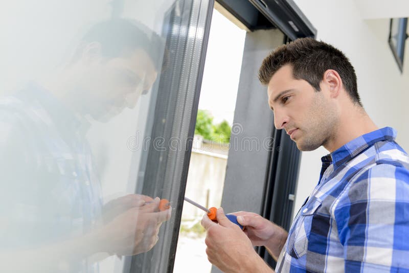 Fitting new door frame stock photo. Image of installation 93832976