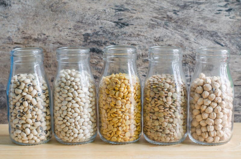 Five Kinds of Dry Organic Cereal and Grain Seed in Glass Bottle on ...