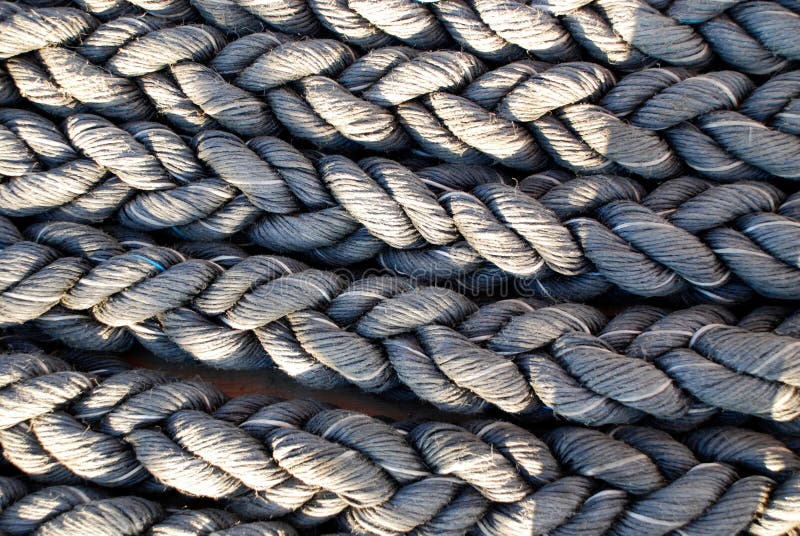Closeup on parallel ropes stock image. Image of cable 158110615