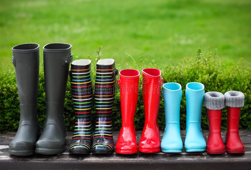 Five pairs of a colorful rain boots. Family concept