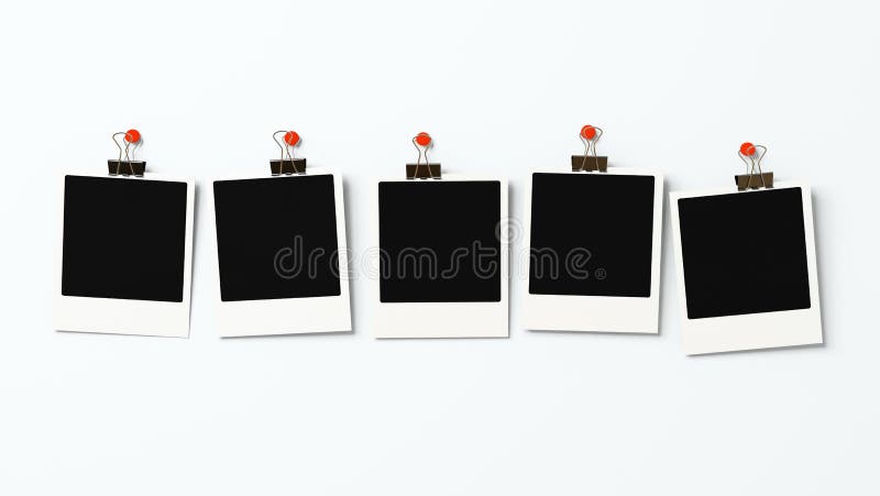 Five polaroid blanks on a wall
