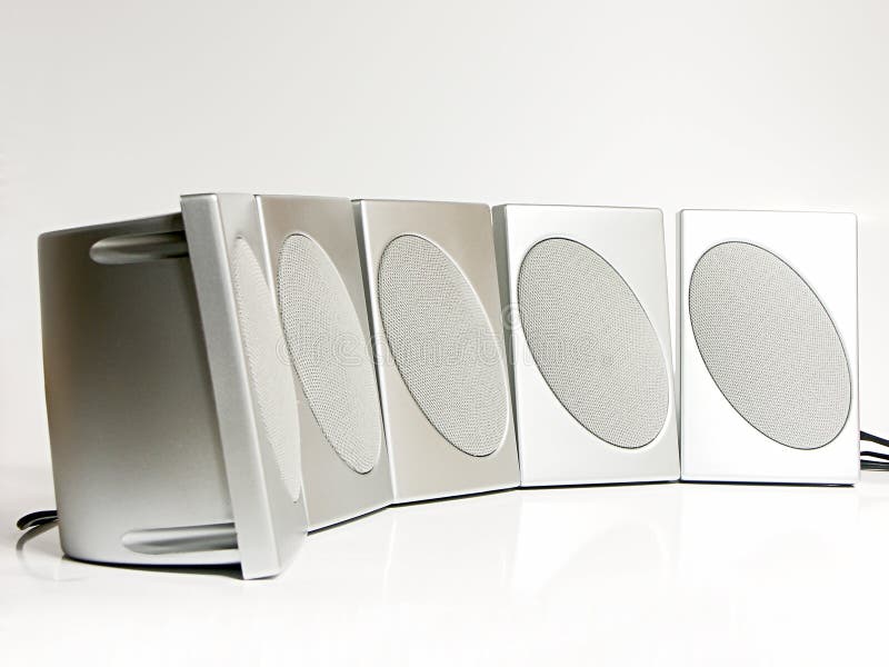 Five silver speakers